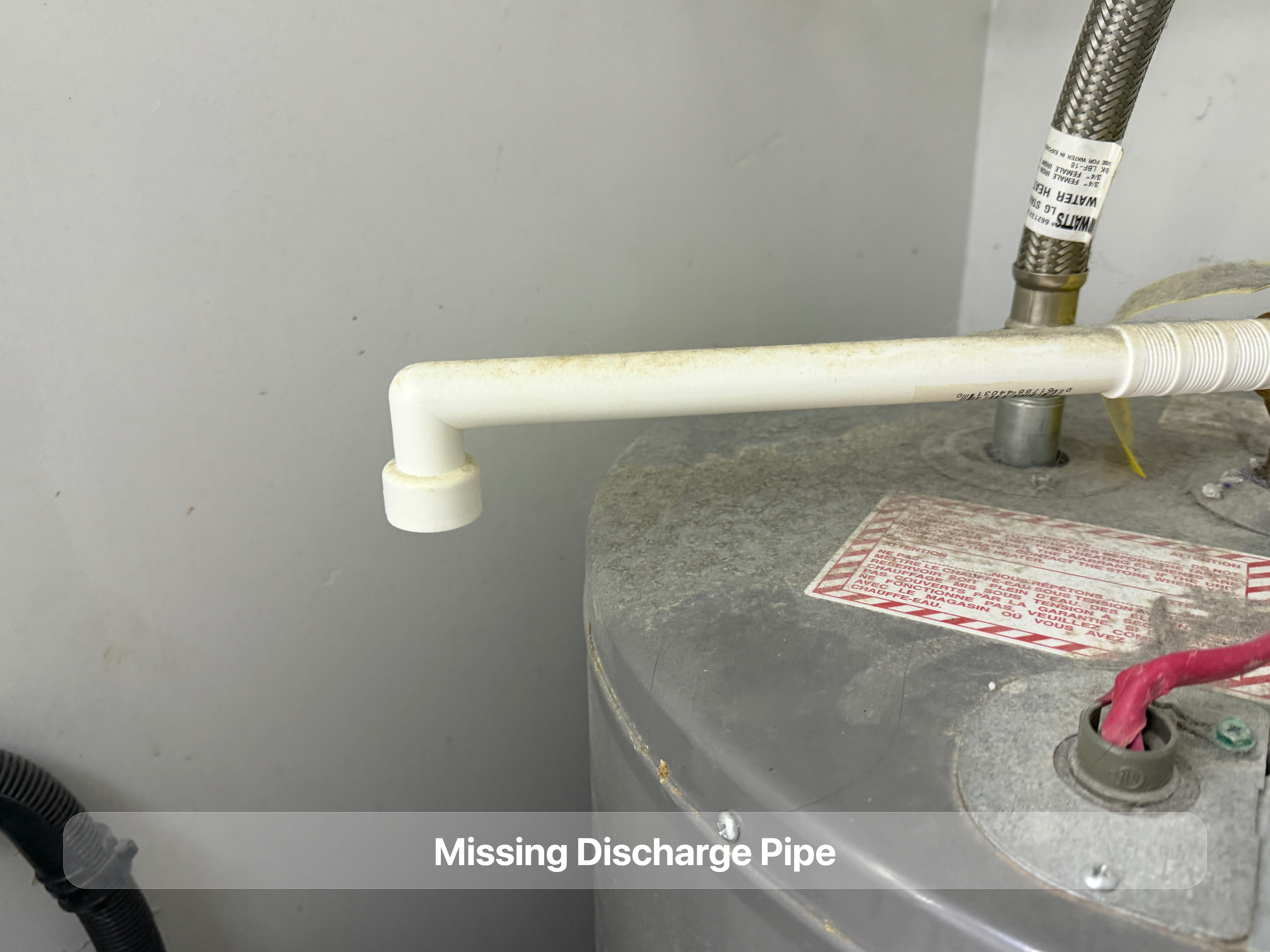 Water heater discharge pipe